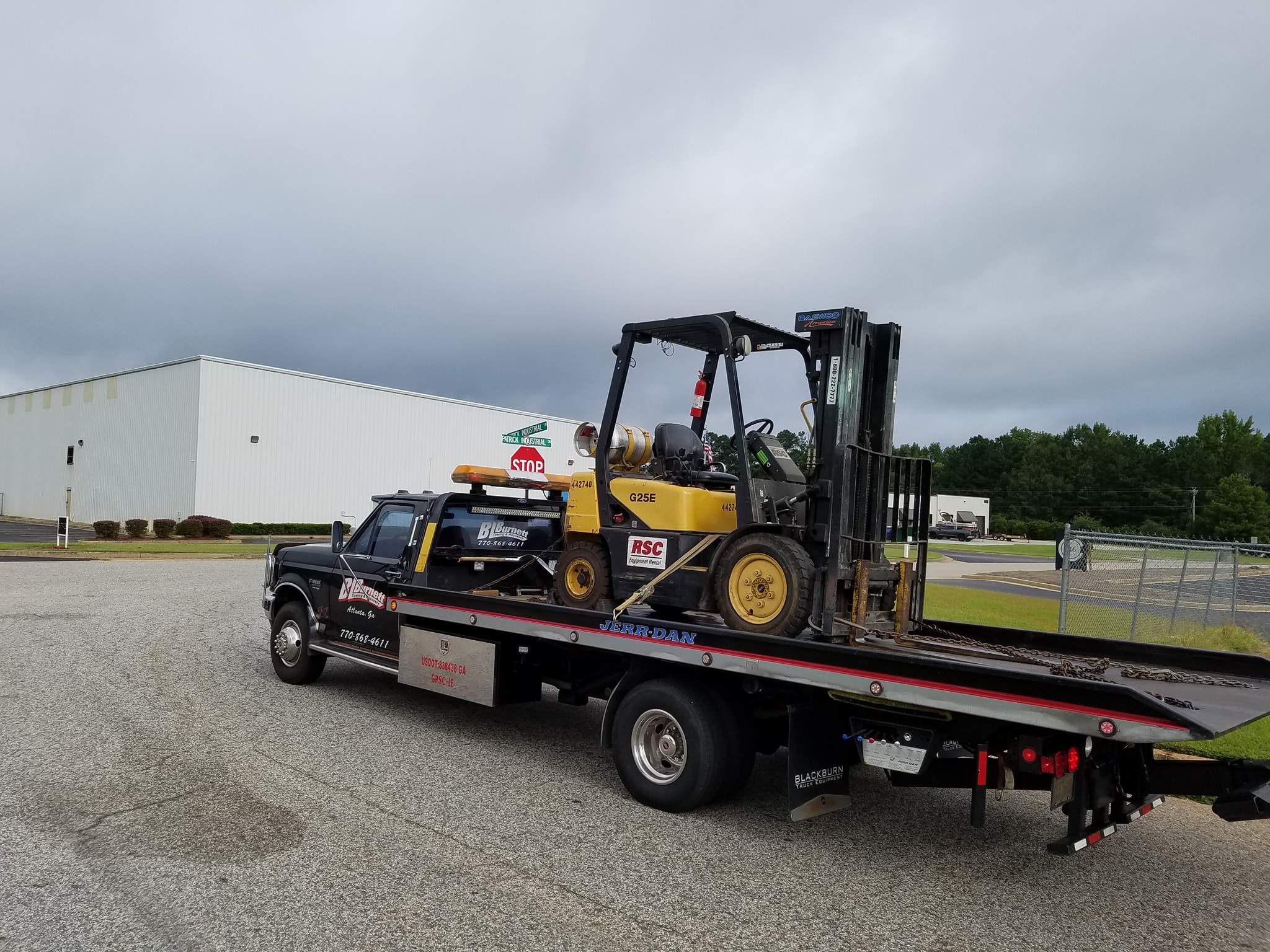 Skit stir on back of tow truck.