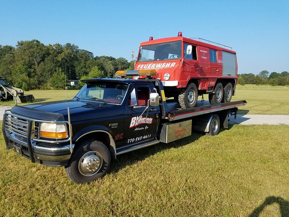 Emergency truck on tow truck.